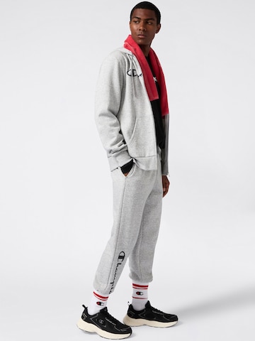 Champion Authentic Athletic Apparel Zwężany krój Spodnie w kolorze szary