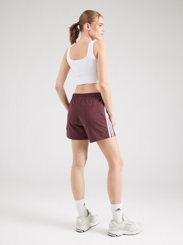regular Pantaloni sportivi di ADIDAS SPORTSWEAR in rosso