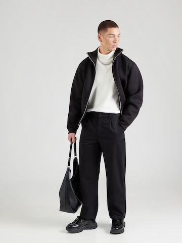 juoda KARL LAGERFELD JEANS Laisvas Klostuotos kelnės