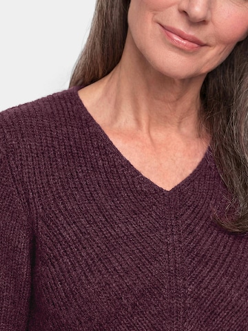 Goldner Pullover in Rot