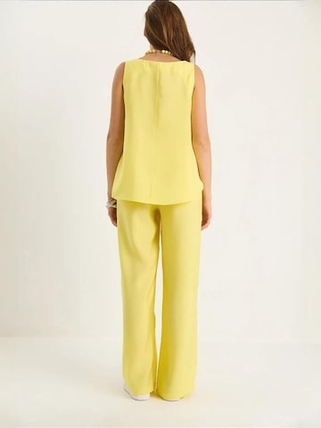 Pantalons de tailleur Bianco Lucci en jaune