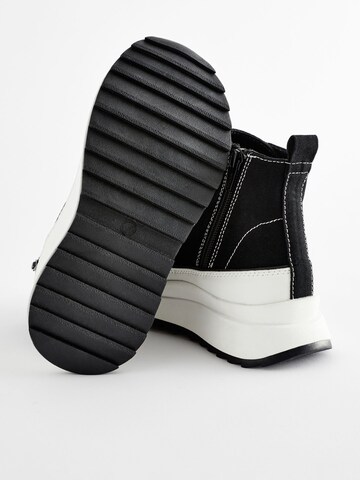 Baskets Next en noir