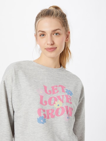 Dorothy Perkins Tréning póló 'Let Love Grow' - szürke