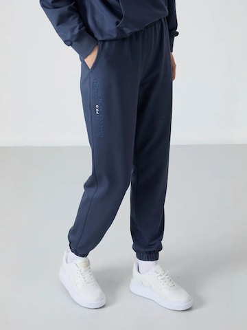 Tommy Life Joggingpak in Blauw