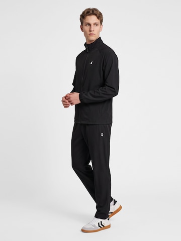 Hummel Tapered Sporthose 'Pulse Workout' in Schwarz