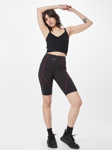 Skinny Pantalon de sport HKMX en noir