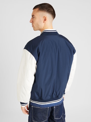 Tommy Jeans Tussenjas in Blauw