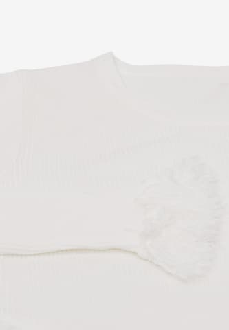 Pullover di swirly in bianco
