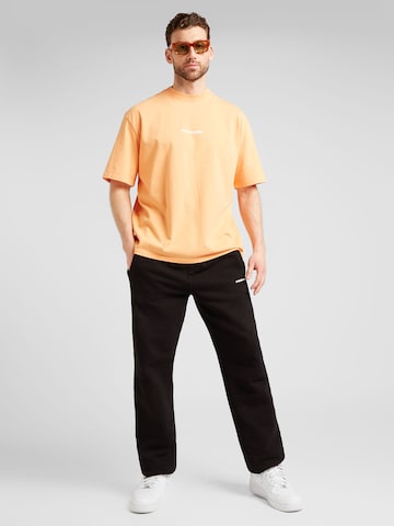 T-Shirt 'COLNE' Pegador en orange