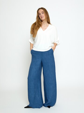 Top 'Triniti' di minus in bianco