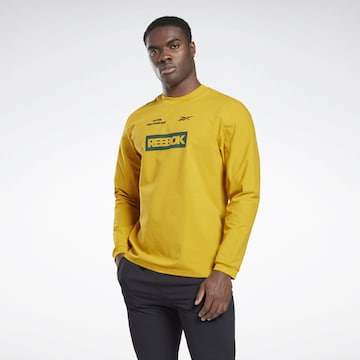 Reebok - Camiseta funcional en amarillo: frente