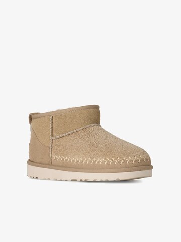 UGG - Botas 'Classic Ultra Mini' em bege