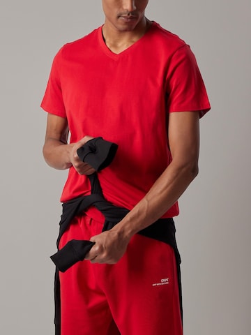 regular Pantaloni di OWN Off With Nature in rosso