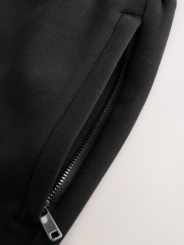 Tapered Pantaloni di Next in nero