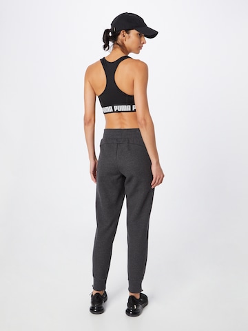 PUMA Tapered Workout Pants 'Essentials' in Grey