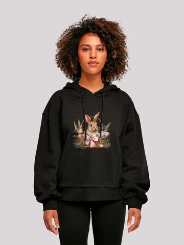 F4NT4STIC Sweatshirt 'Osterhasen Korb Dekor' in Schwarz: Vorderseite