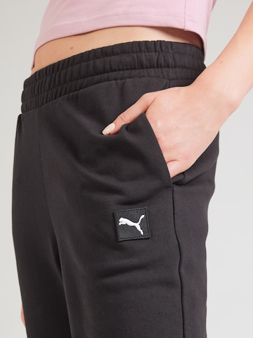 PUMA - Tapered Pantalón 'ESS' en negro