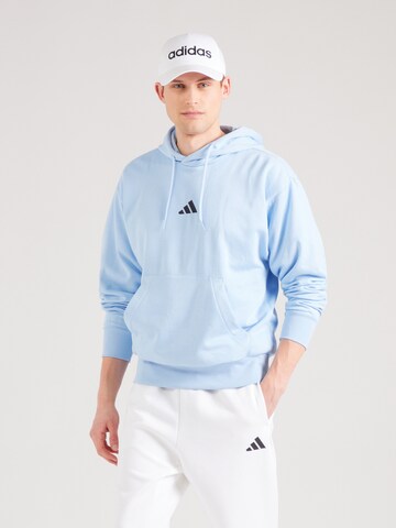 ADIDAS SPORTSWEAR Sports sweatshirt 'FEELCOZY' in Blue: front