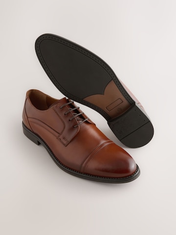 Next Čevlji na vezalke | rjava barva