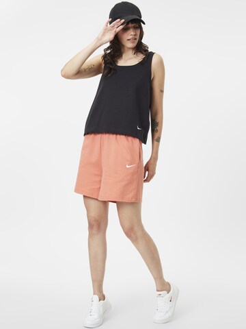 Nike Sportswear - Loosefit Calças em laranja