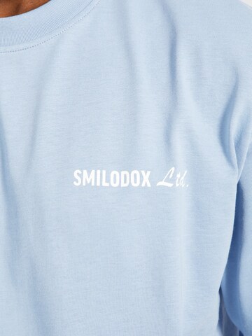 Smilodox Oversize T-Shirt ' Liquid Brail ' in Blau