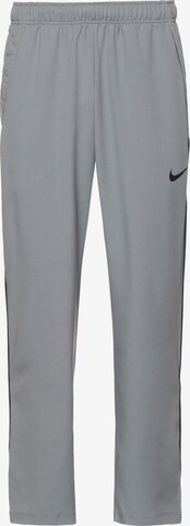 NIKE Loose fit Workout Pants 'Team' in Grey: front