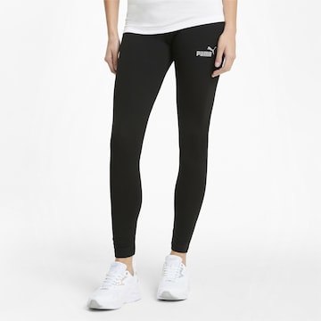 PUMA Skinny Leggings in Black: front