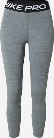 Skinny Pantalon de sport NIKE en gris : devant