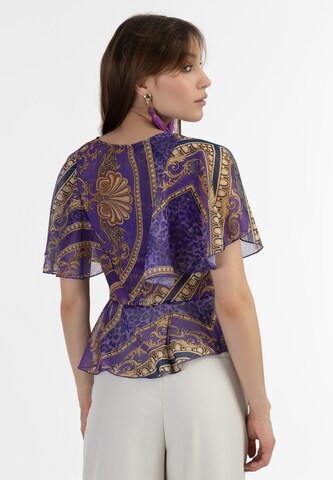 faina - Blusa em roxo