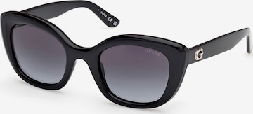 Lunettes de soleil GUESS en noir : devant