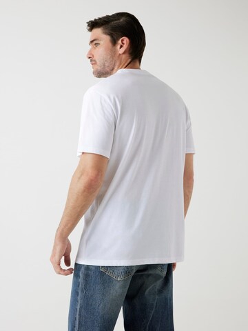Maglietta di GUESS in bianco
