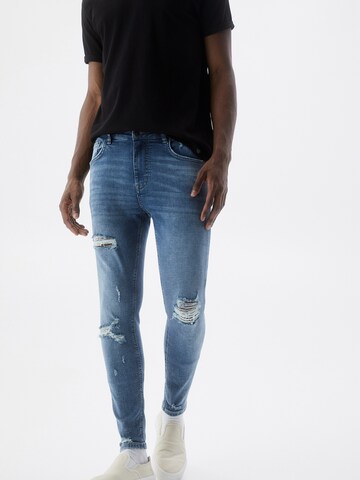 Skinny Jeans de la Pull&Bear pe albastru: față