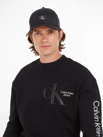 Calvin Klein Jeans Шапка с козирка в черно: отпред