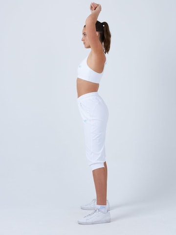 Loosefit Pantalon de sport 'Caprihose mit Taschen' SPORTKIND en blanc