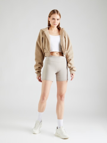 Reebok Skinny Sportbroek in Beige