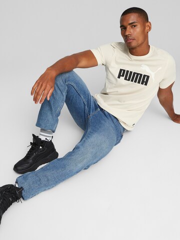 PUMA Sportshirt 'Essentials' in Weiß