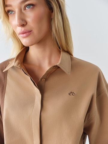 MB by Marta Buzolic - Blusa funcional en beige