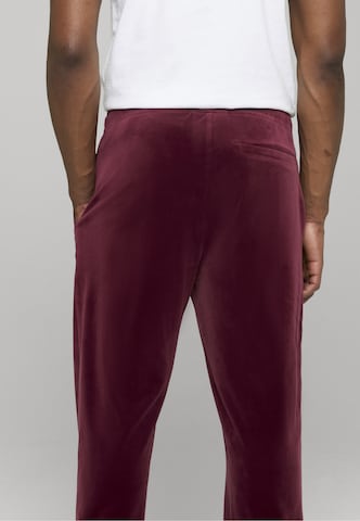 ROCAWEAR Zwężany krój Spodnie 'Austin' w kolorze czerwony