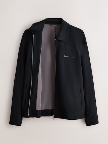 Next Between-Season Jacket 'Motionflex' in Black