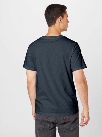 ABOUT YOU T-shirt 'Lio' i blå