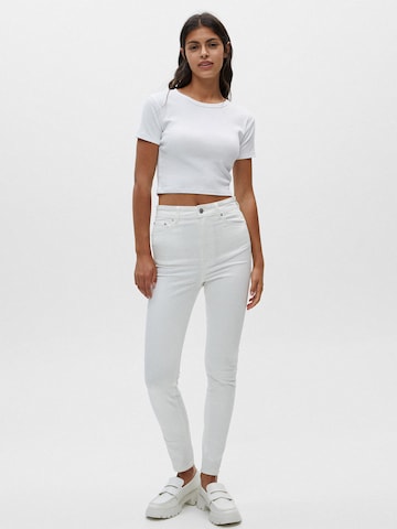 Skinny Jeans de la Pull&Bear pe alb: față