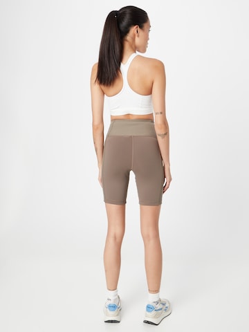 Reebok Skinny Sporthose in Beige