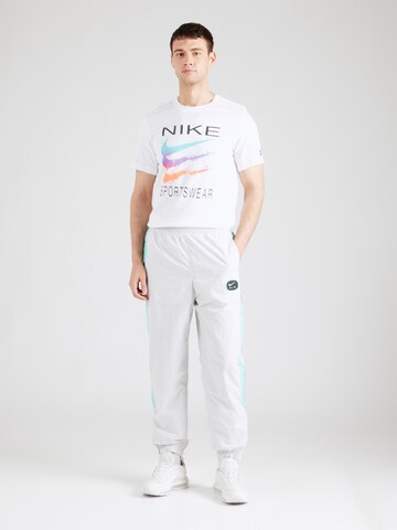 Nike Sportswear Loose fit Trousers 'AIR' in White