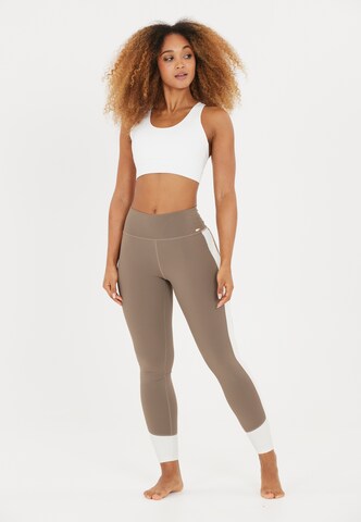 Athlecia Skinny Sports trousers 'Lris' in Brown