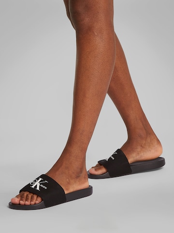 Calvin Klein Jeans Pantolette i svart