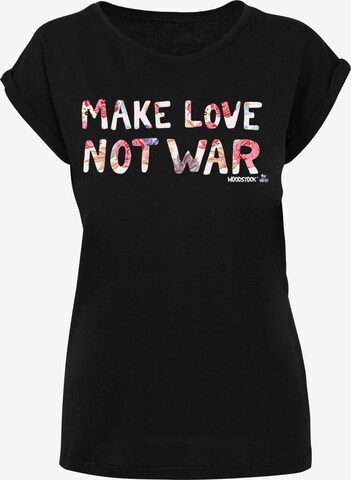 T-shirt 'WOODSTOCK Make Love Not War Floral ' F4NT4STIC en noir : devant
