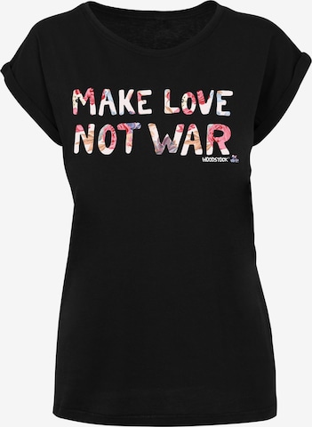 F4NT4STIC Shirt 'WOODSTOCK Make Love Not War Floral ' in Schwarz: predná strana