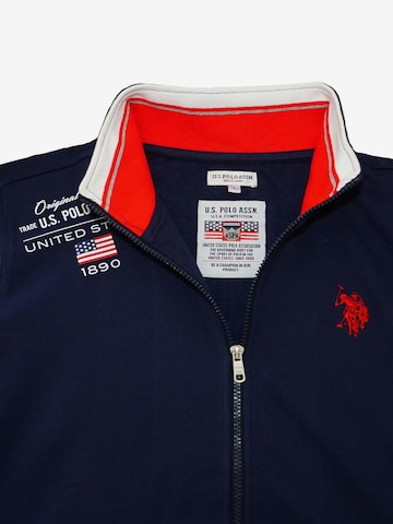 Veste de survêtement U.S. POLO ASSN. en bleu