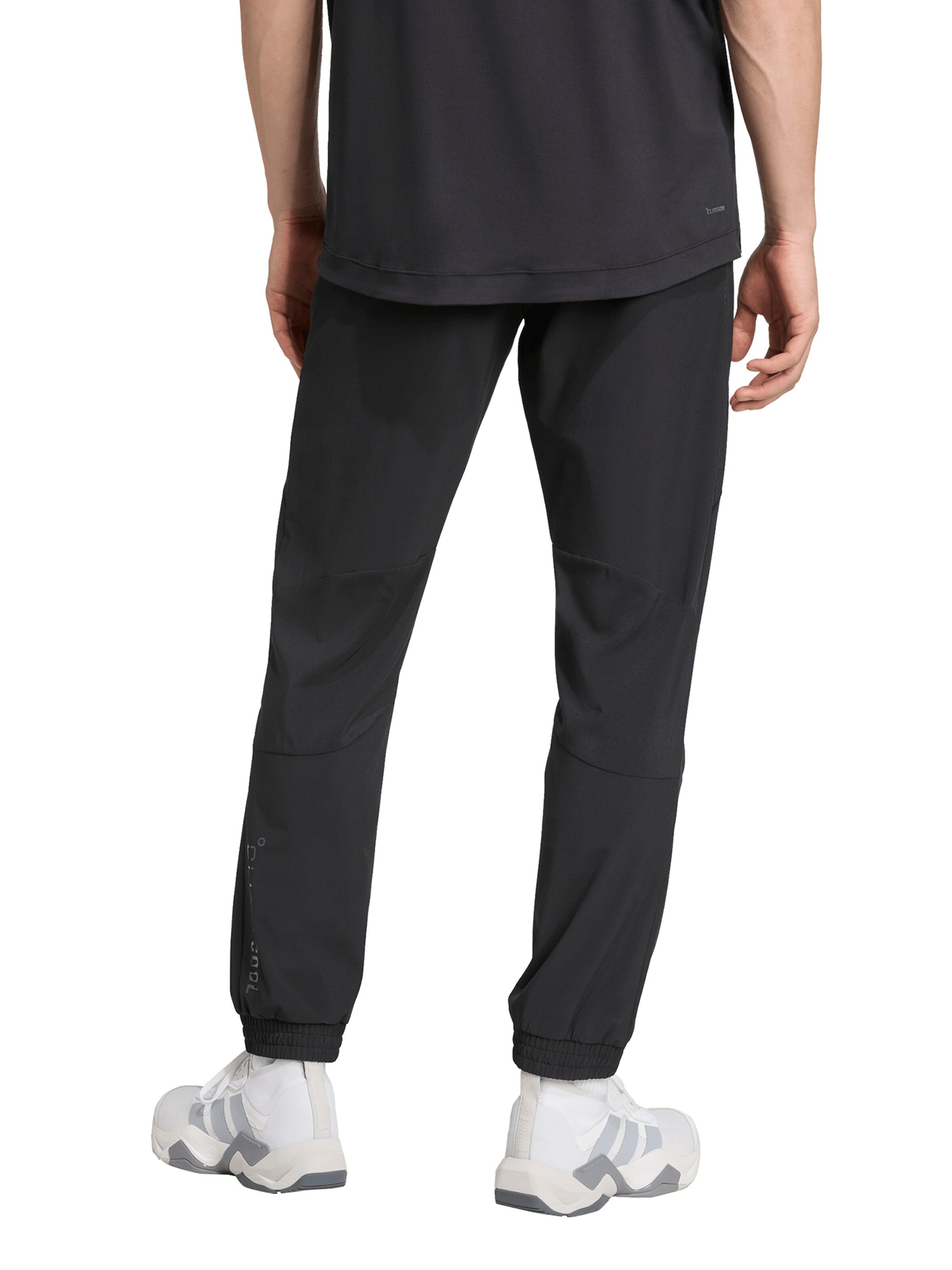 Tapered Pantaloni sportivi 'Tech Apparel' di ADIDAS PERFORMANCE in nero