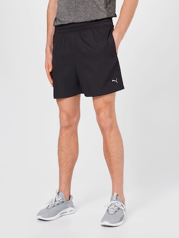 PUMA Regular Workout Pants in Black: front